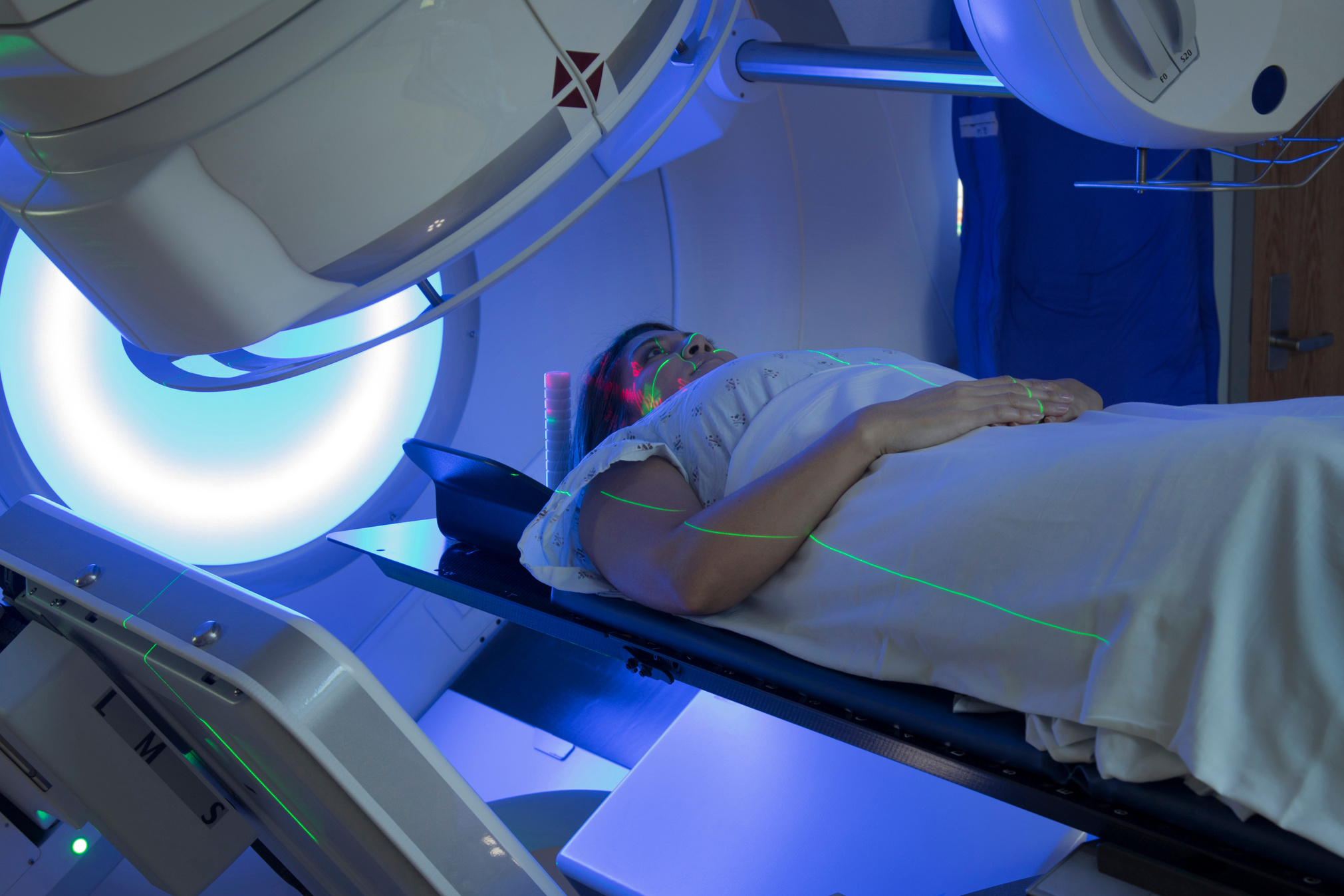 Asian Woman receiving Radiation Therapy Treatments for Cancer